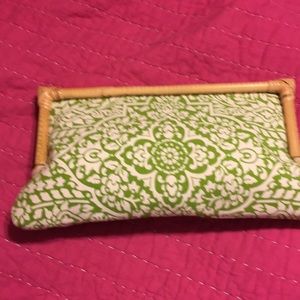 Green and white floral print clutch